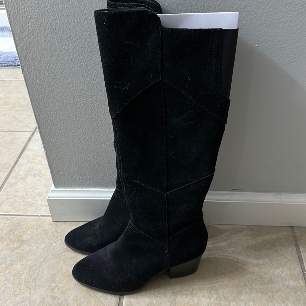 Black suede tall boot.